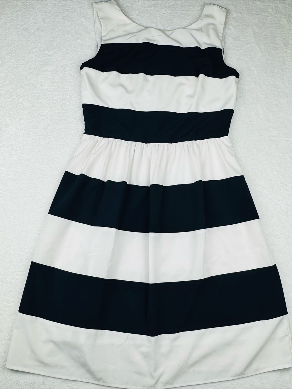 Dress Barn navy blue and white stripe sleeveless dress. Size 6.